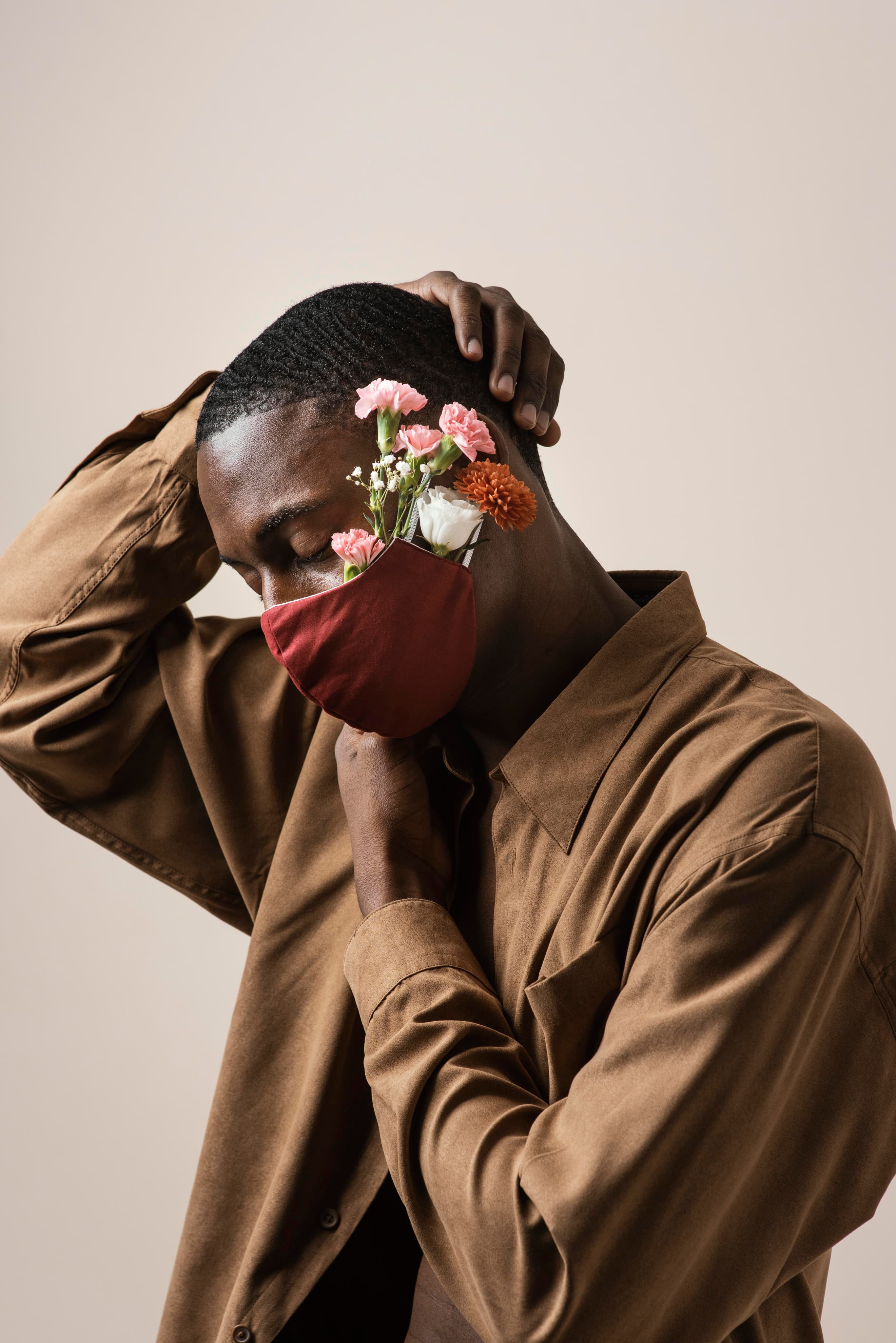 Creative wearing a floral face mask